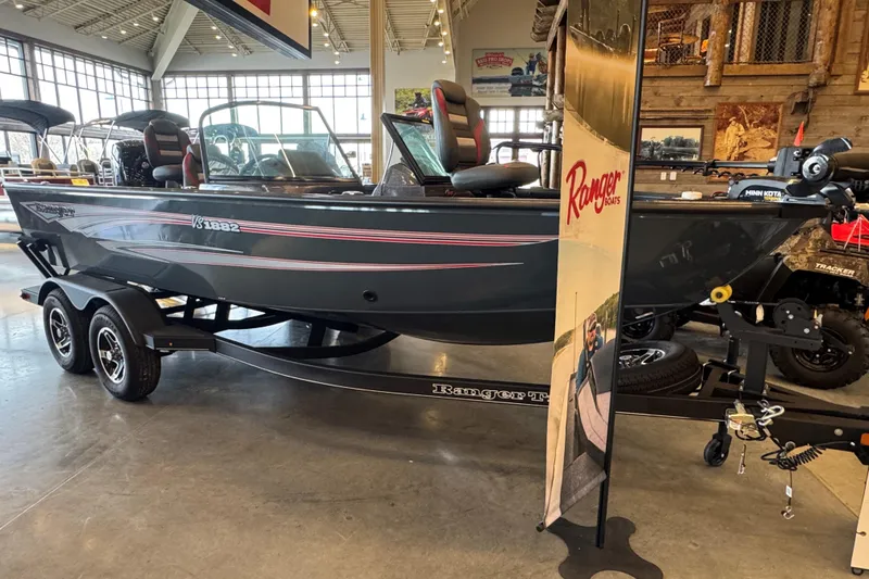 Slide: The Image of 2024 Ranger VS1882SC Angler boat displayed indoors on a trailer. - 69