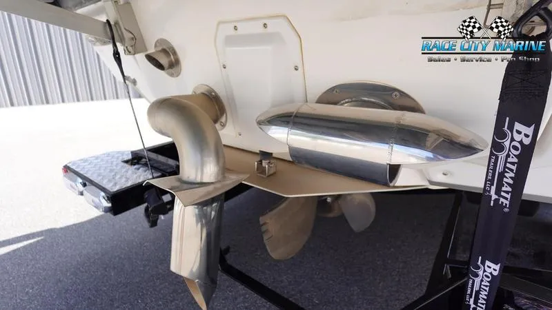 Slide: The Image of 2021 Nautique Super Air Nautique G23 boat propeller and exhaust system. - 10