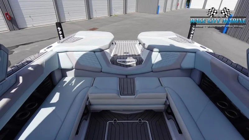 Slide: The Image of 2021 Nautique Super Air Nautique G23 interior with spacious seating and sleek design. - 16