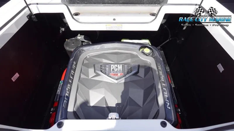 Slide: The Image of 2021 Nautique Super Air Nautique G23 engine compartment with PCM engine branding. - 18