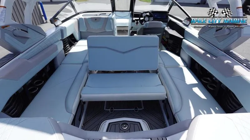 Slide: The Image of 2021 Nautique Super Air Nautique G23 interior with luxurious seating and modern design. - 27