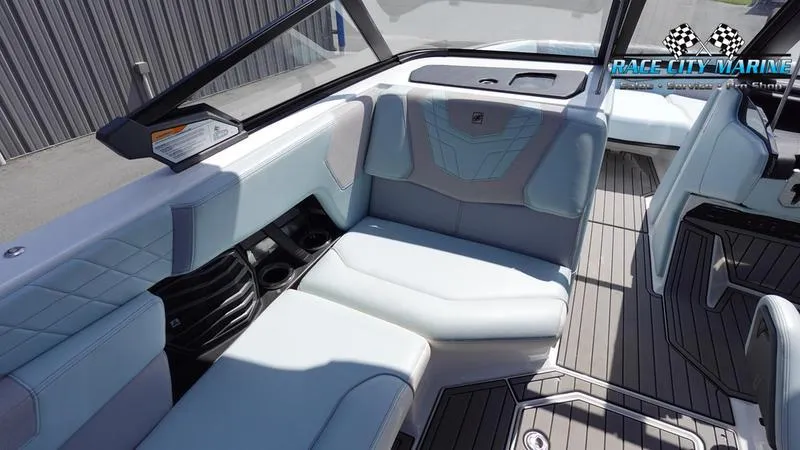 Slide: The Image of 2021 Nautique Super Air Nautique G23 interior with luxurious seating and modern design. - 29