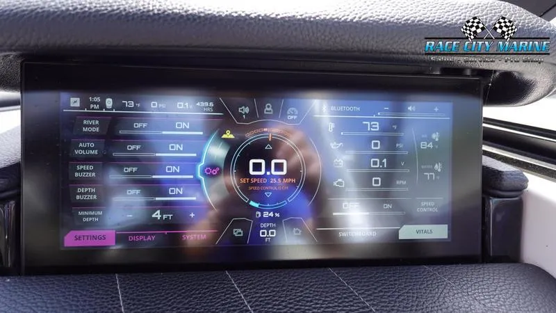 Slide: The Image of Touchscreen display of 2021 Nautique Super Air Nautique G23 boat dashboard controls. - 39