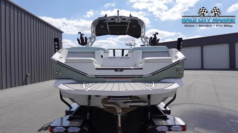 Slide: The Image of 2021 Nautique Super Air Nautique G23 boat at Race City Marine dealership. - 4