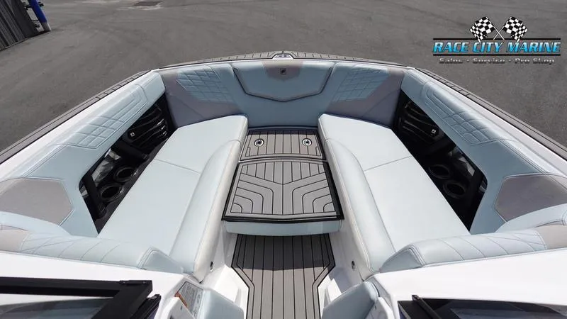 Slide: The Image of 2021 Nautique Super Air Nautique G23 boat interior with spacious seating and sleek design. - 43