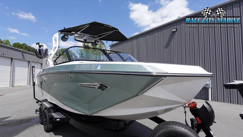 Slide: The Image of 2021 Nautique Super Air Nautique G23 boat at Race City Marine dealership. - 5