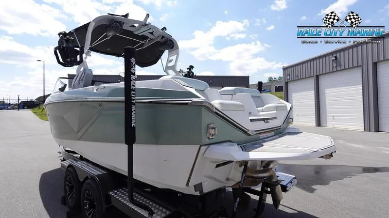 Slide: The Image of 2021 Nautique Super Air Nautique G23 boat on trailer at Race City Marine. - 7
