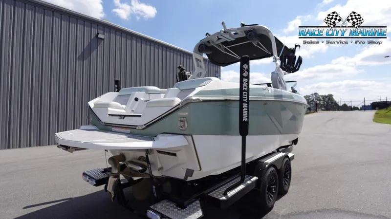 Slide: The Image of 2021 Nautique Super Air Nautique G23 boat at Race City Marine dealership. - 8