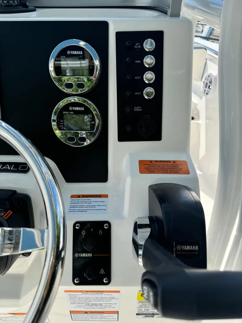 Slide: The Image of 2025 Robalo R200 Center Console dashboard with Yamaha controls and gauges. - 21