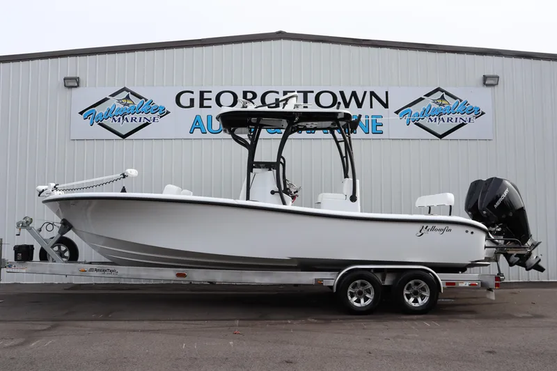 Slide: The Image of 2025 Yellowfin 26 Hybrid boat on trailer at Georgetown Auto Marine. - 1