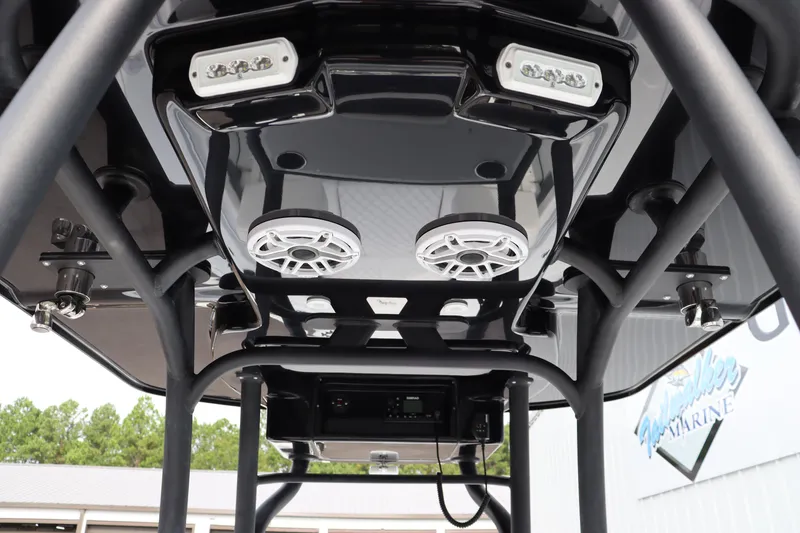 Slide: The Image of 2025 Yellowfin 26 Hybrid boat with advanced audio and lighting system. - 18