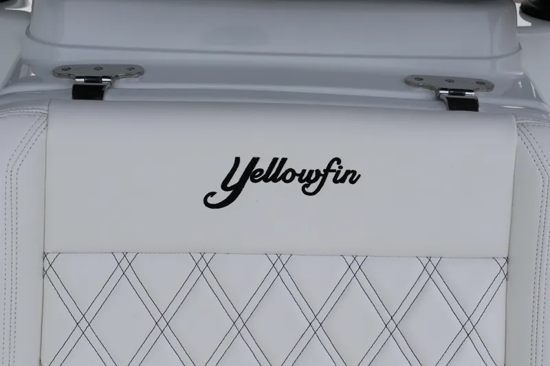 Slide: The Image of 2025 Yellowfin 26 Hybrid boat seat with logo and diamond stitching. - 24
