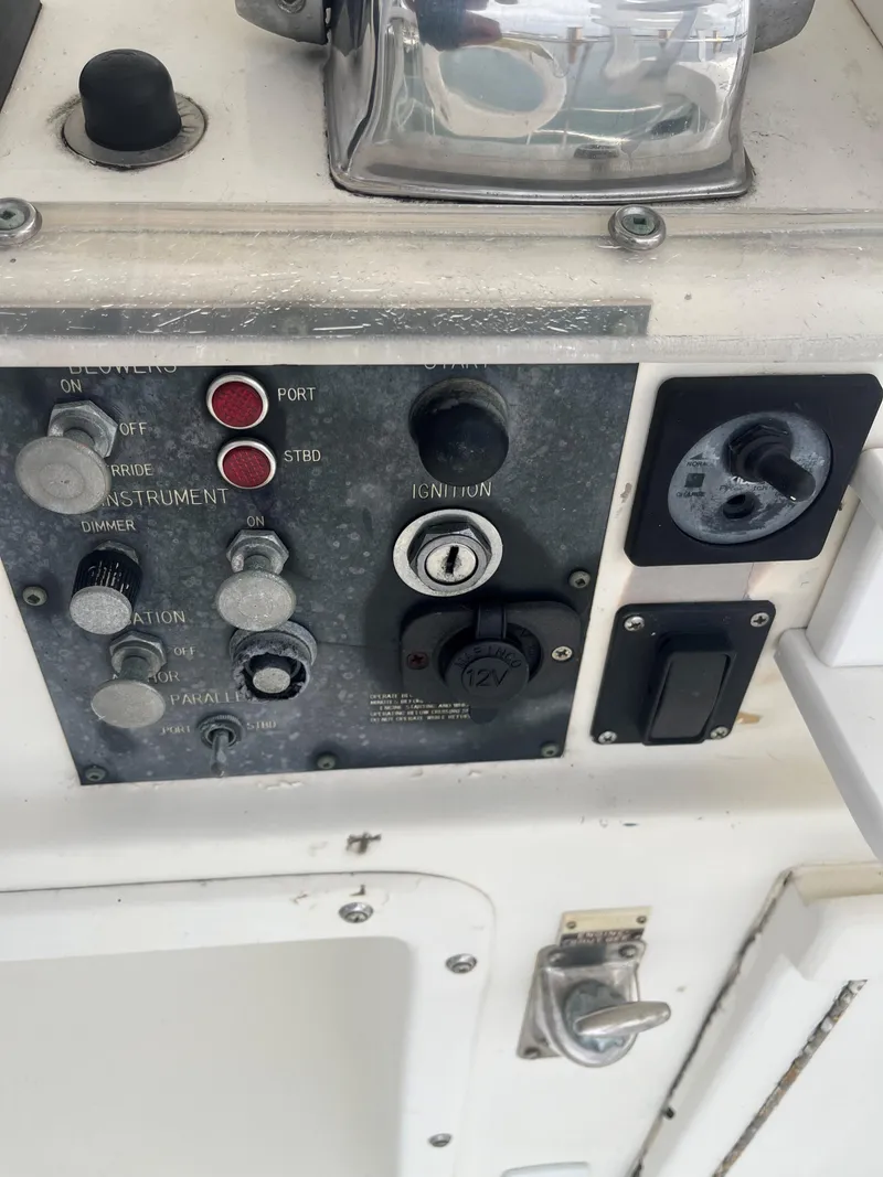 Slide: The Image of Control panel of a 1985 Hatteras 45 Convertible boat. - 21