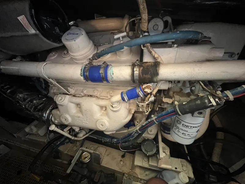 Slide: The Image of Engine of 1985 Hatteras 45 Convertible boat, showcasing mechanical components. - 38