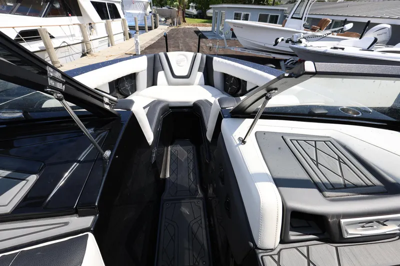 Slide: The Image of 2021 Tigé 23ZX boat interior with sleek seating and modern design. - 12