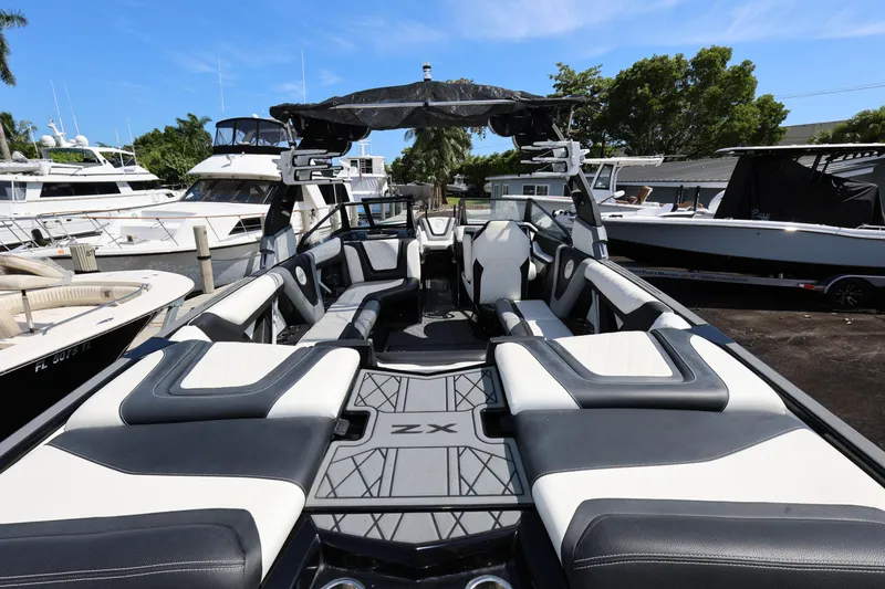 Slide: The Image of 2021 Tigé 23ZX boat interior with sleek seating and modern design. - 8