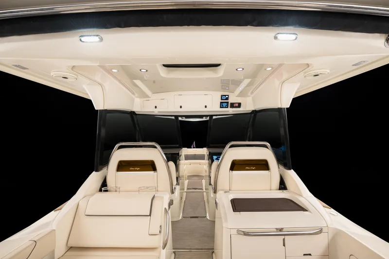 Slide: The Image of Interior of 2026 Chris-Craft Calypso 35, featuring luxurious seating and sleek dashboard design. - 10
