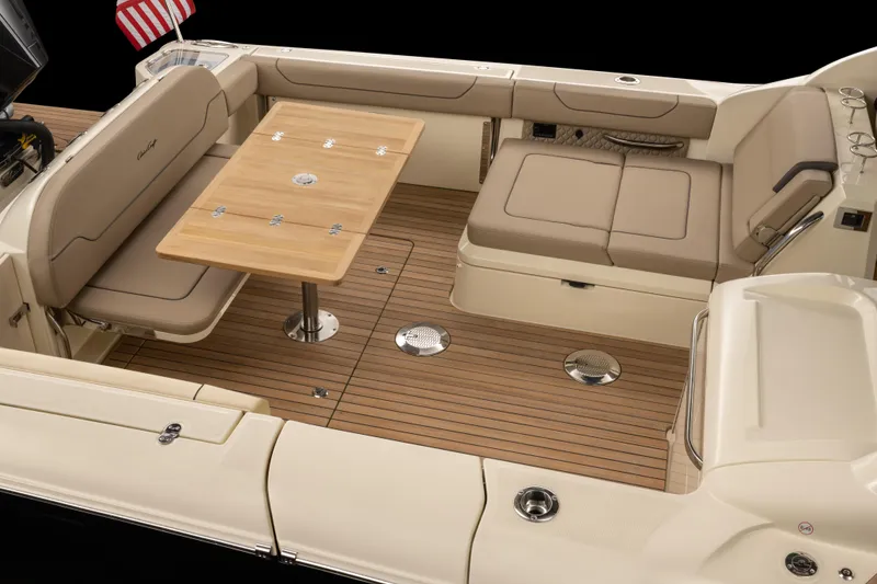 Slide: The Image of Luxurious helm of 2026 Chris-Craft Calypso 35 with leather seat and wooden steering wheel. - 12