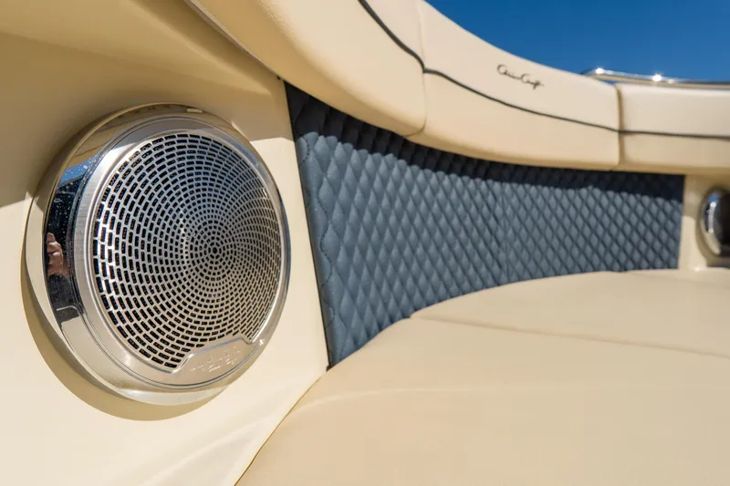 Slide: The Image of 2026 Chris-Craft Calypso 35 interior detail with speaker and quilted upholstery. - 28