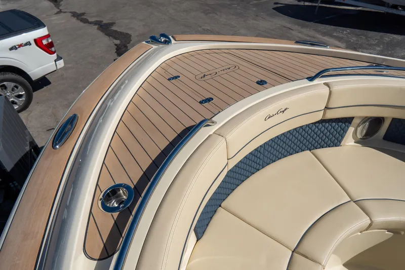 Slide: The Image of 2026 Chris-Craft Calypso 35 boat with elegant seating and teak deck details. - 29