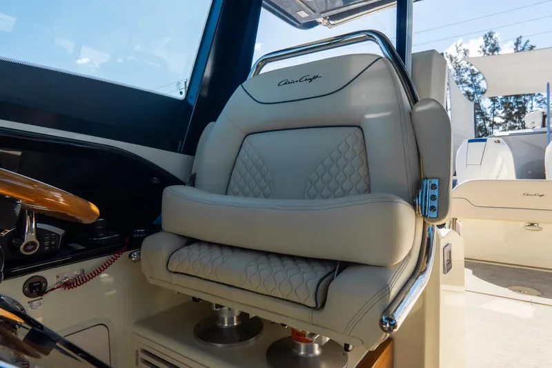 Slide: The Image of Luxurious helm seat on 2026 Chris-Craft Calypso 35 boat, featuring elegant design and comfort. - 31