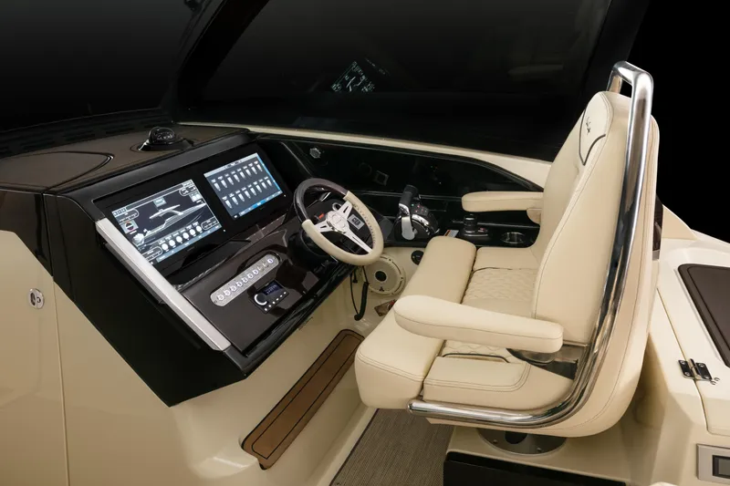 Slide: The Image of 2025 Chris-Craft Calypso 35 boat interior with beige seating and wooden table. - 8