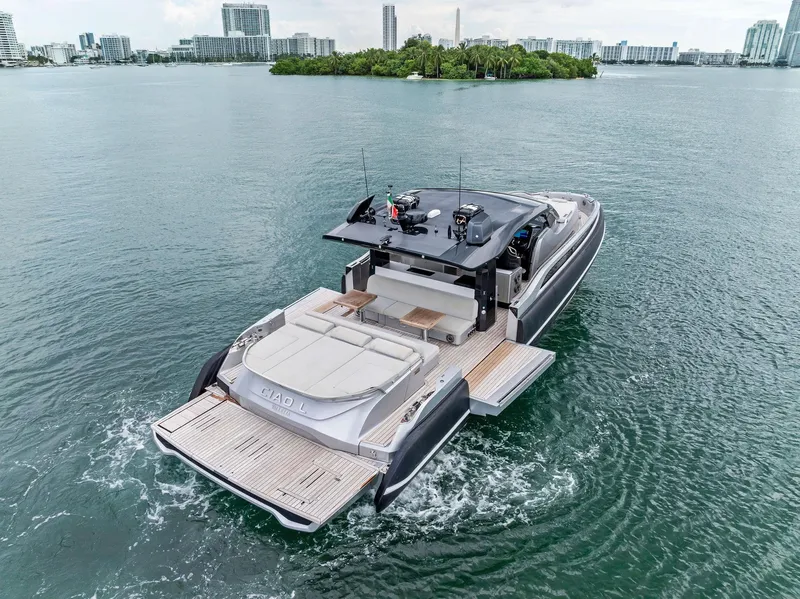 Slide: The Image of 2022 SACS Rebel 55 luxury yacht cruising in scenic waters. - 5