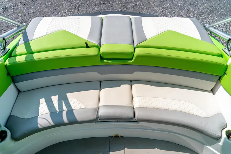 Slide: The Image of 2014 Rinker Captiva 200 MTX boat with green and white seating. - 19