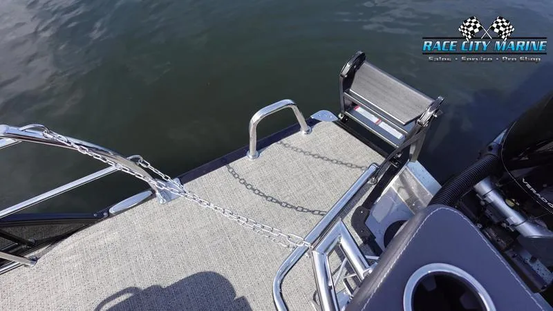 Slide: The Image of 2025 Barletta L25UCAT boat deck with ladder and Race City Marine logo. - 13