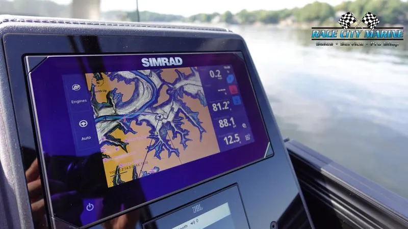 Slide: The Image of Simrad navigation display on 2025 Barletta L25UCAT boat, Race City Marine logo visible. - 30