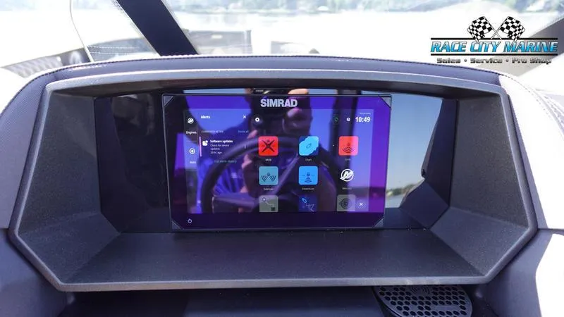 Slide: The Image of Simrad display on 2025 Barletta L25UCAT boat dashboard, Race City Marine logo visible. - 34