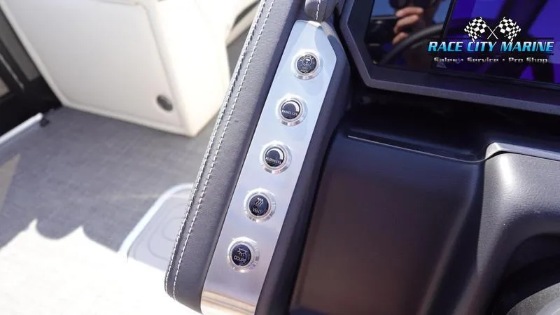 Slide: The Image of Control panel of 2025 Barletta L25UCAT boat with Race City Marine branding. - 35