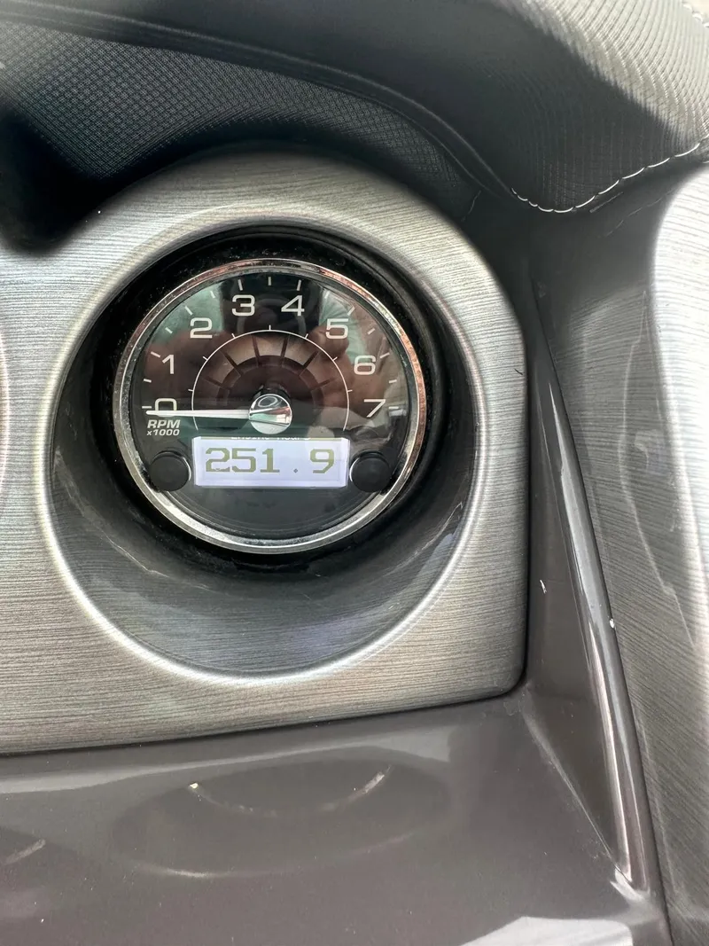 Slide: The Image of Close-up of 2014 Monterey 328 Super Sport gauge displaying 251.9 hours. - 19