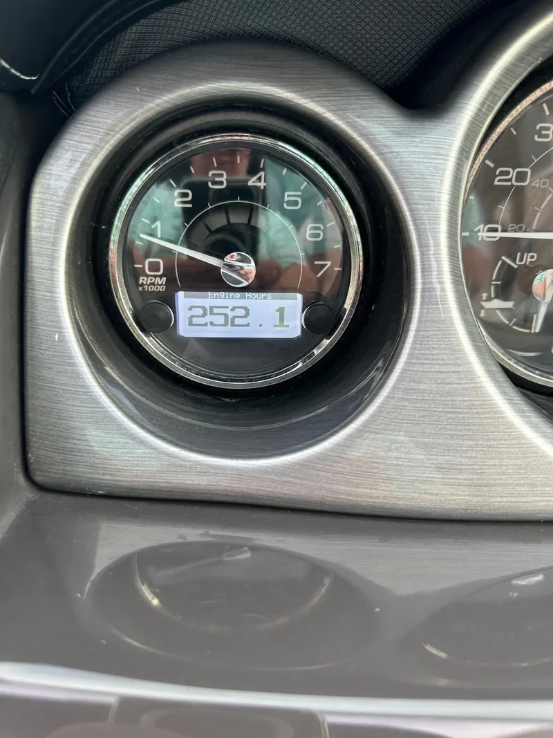 Slide: The Image of Close-up of 2014 Monterey 328 Super Sport tachometer displaying 252.1 hours. - 21