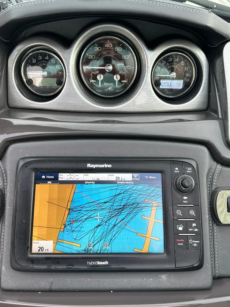 Slide: The Image of Dashboard of a 2014 Monterey 328 Super Sport with navigation system. - 24
