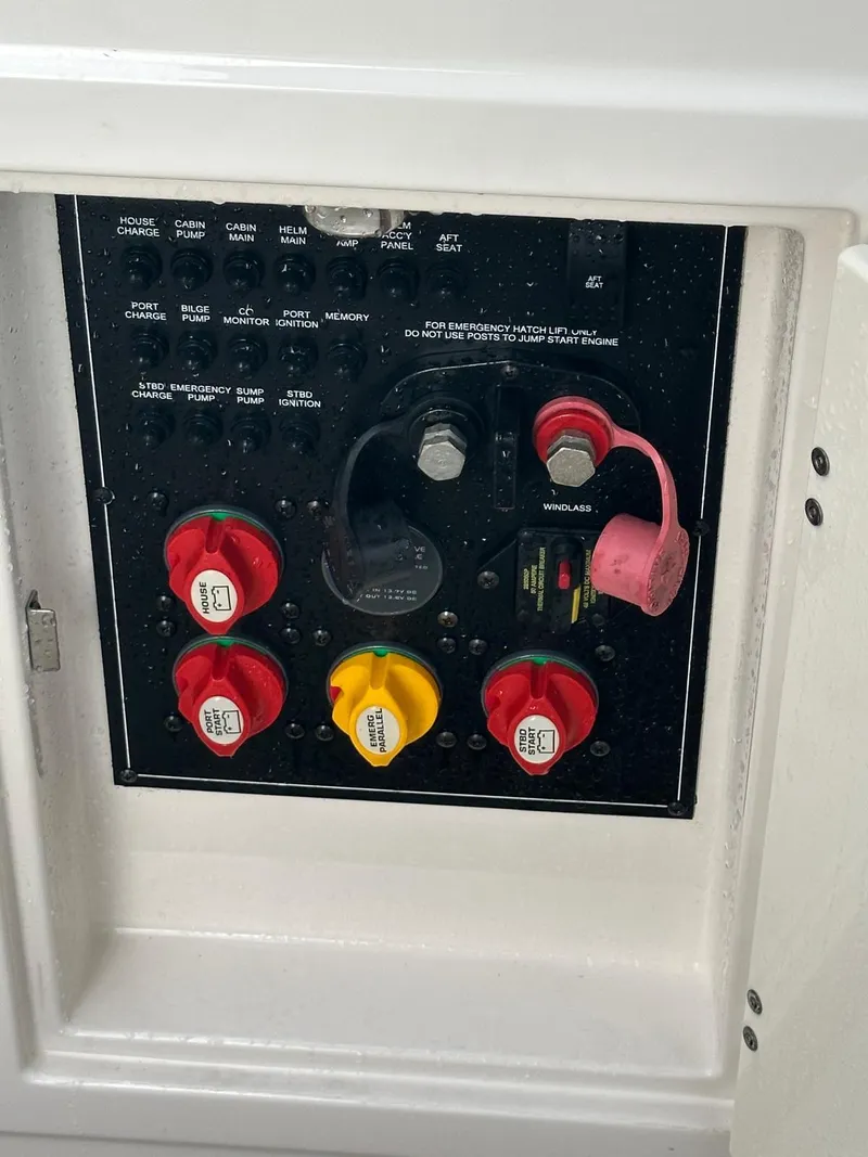 Slide: The Image of Control panel of a 2014 Monterey 328 Super Sport boat with labeled switches and knobs. - 25