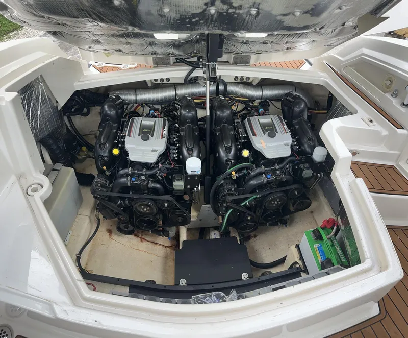 Slide: The Image of 2014 Monterey 328 Super Sport engine compartment with dual engines. - 26