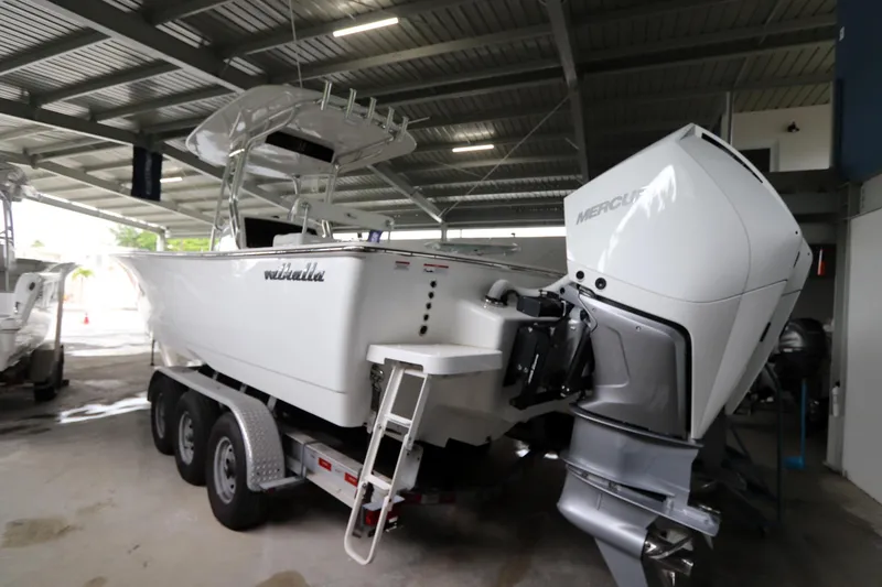 Slide: The Image of 2025 Valhalla Boatworks V-29 Hybrid on trailer with Mercury outboard engine. - 13