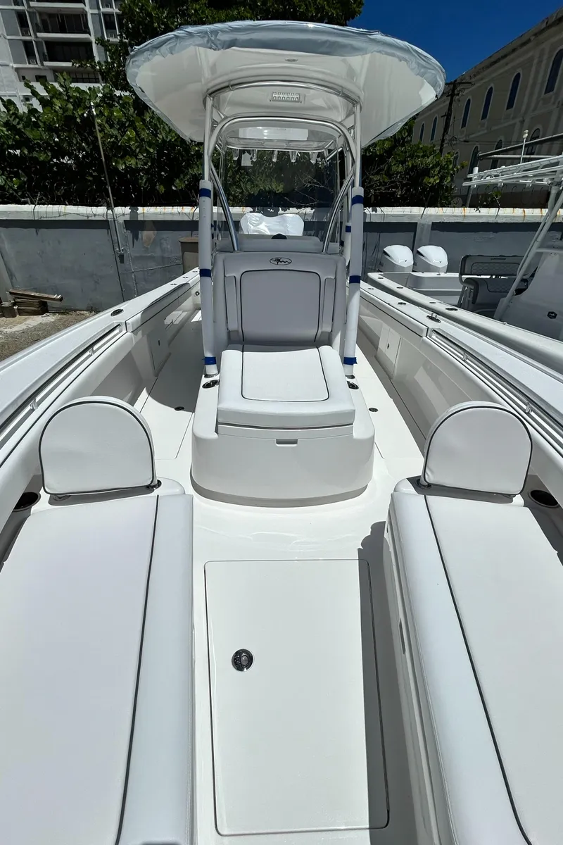 Slide: The Image of 2025 Valhalla Boatworks V-29 Hybrid, sleek white deck, modern design, spacious seating. - 5
