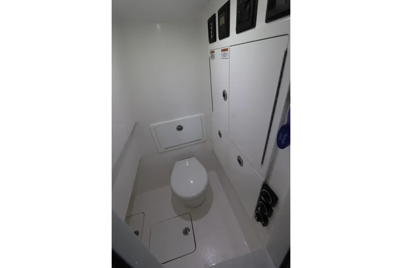 Slide: The Image of 2025 Valhalla Boatworks V-29 Hybrid interior bathroom with modern fixtures and storage. - 8