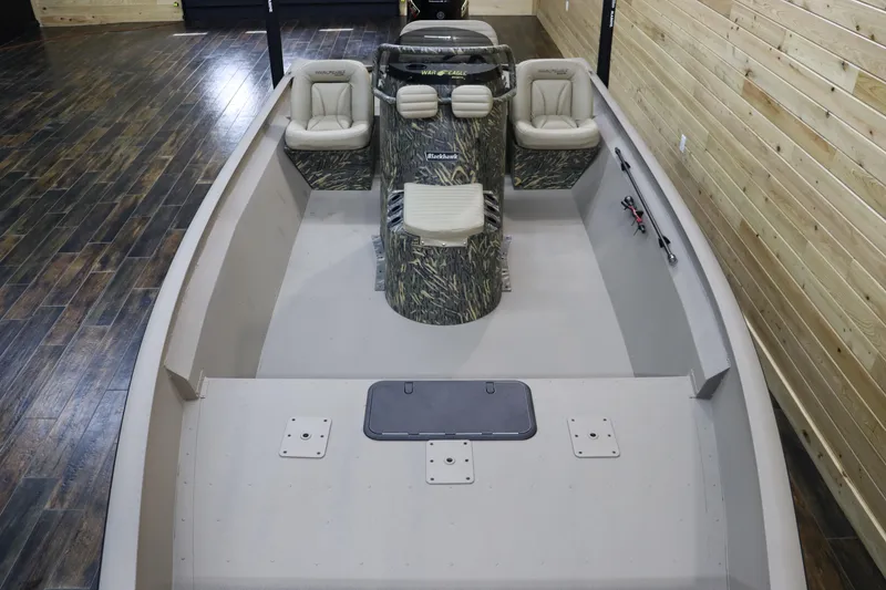 Slide: The Image of 2025 War Eagle 2170 Blackhawk boat interior with camouflage console and seating. - 10