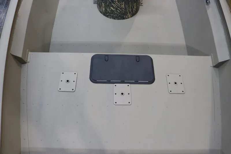 Slide: The Image of 2025 War Eagle 2170 Blackhawk boat interior with storage compartment. - 12