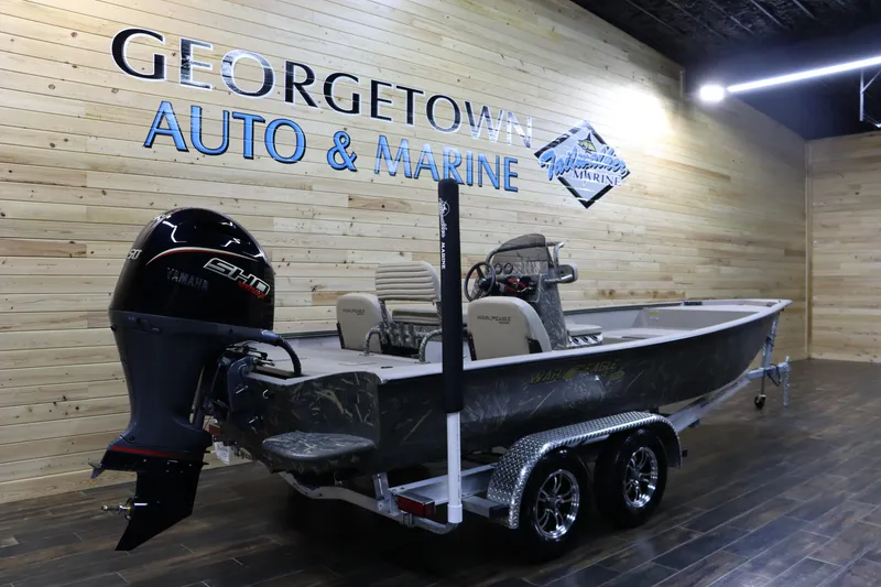 Slide: The Image of 2025 War Eagle 2170 Blackhawk boat displayed at Georgetown Auto & Marine showroom. - 2