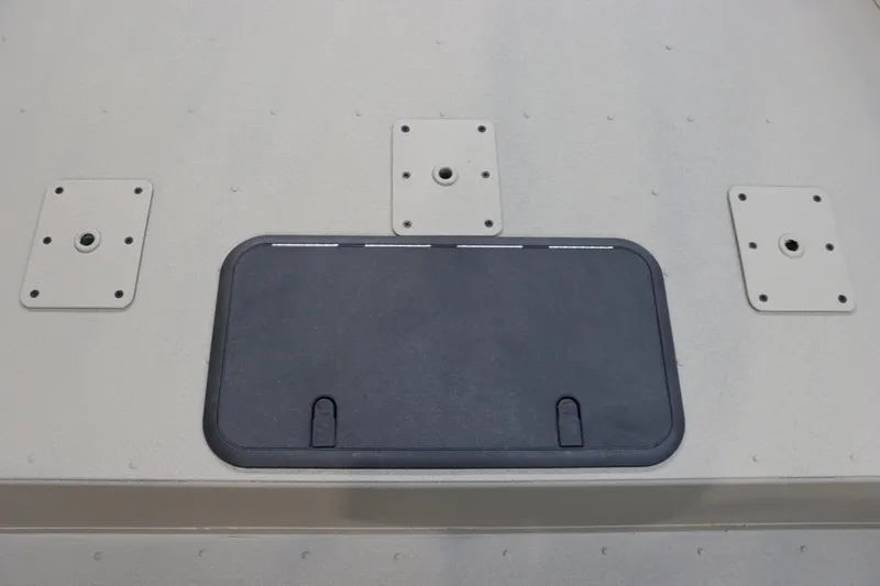 Slide: The Image of War Eagle 2170 Blackhawk 2025 boat deck with mounting plates and storage hatch. - 21