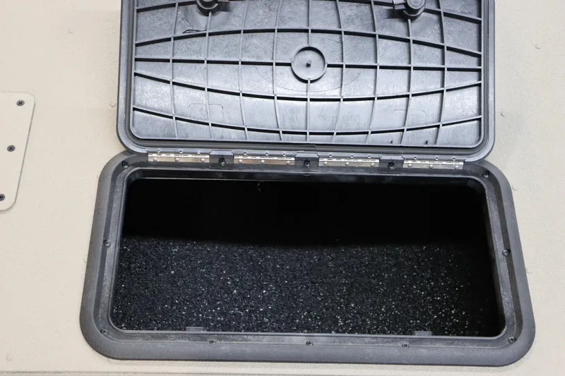 Slide: The Image of Open storage compartment on 2025 War Eagle 2170 Blackhawk boat. - 22