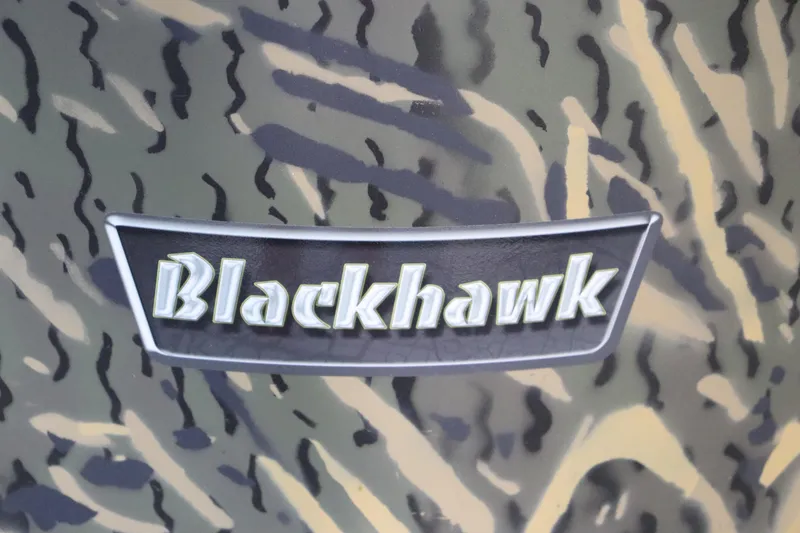 Slide: The Image of 2025 War Eagle 2170 Blackhawk logo on camouflage background. - 28