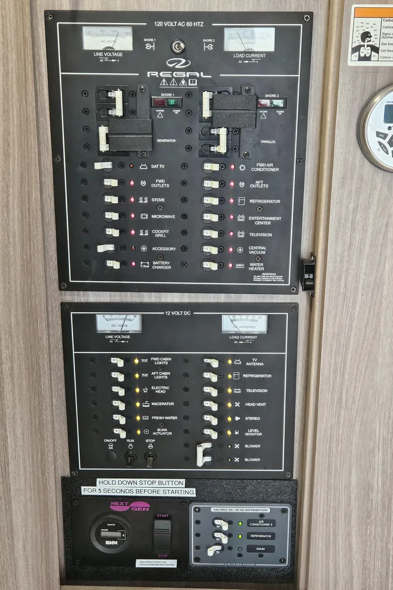 Slide: The Image of Electrical control panel of 2022 Regal 33 XO boat. - 30