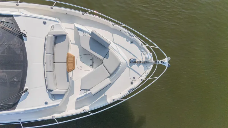 Slide: The Image of Aerial view of 2018 Sea Ray L550 Fly yacht's bow with seating area. - 10