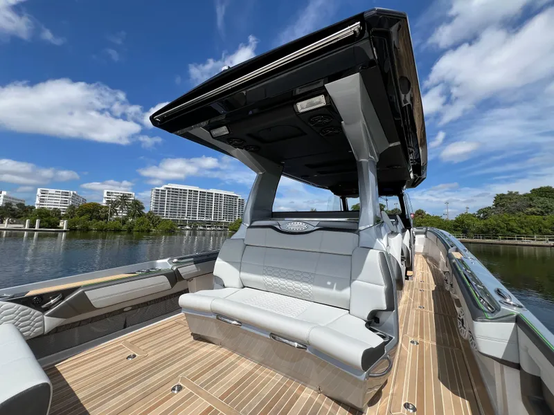Slide: The Image of 2024 Nor-Tech 500 Sport boat with sleek design, spacious deck, and modern features. - 15