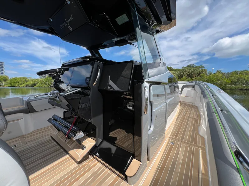 Slide: The Image of 2024 Nor-Tech 500 Sport boat interior with sleek design and modern controls. - 26